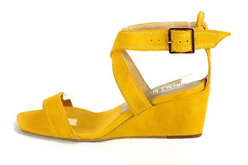 Yellow women's fully open sandals, with crossed straps. Square toe. Medium wedge heels. Profile view - Florence KOOIJMAN